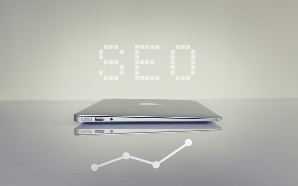 SEO letters and laptop