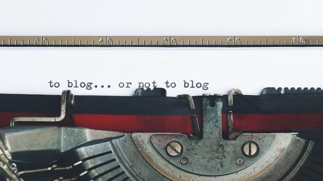 Close up of old-style typewriter with words - to blog or not to blog