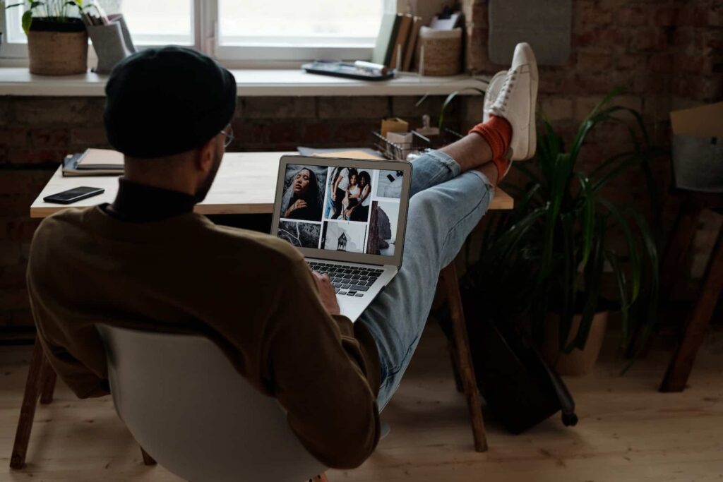 A Fashion Blogger Working With on a Laptop